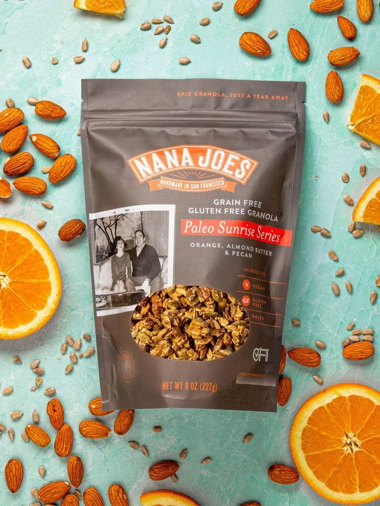 Image may contain: Adult, Person, Food, Produce, Grain, Granola, Citrus Fruit, Fruit, Orange, and Plant