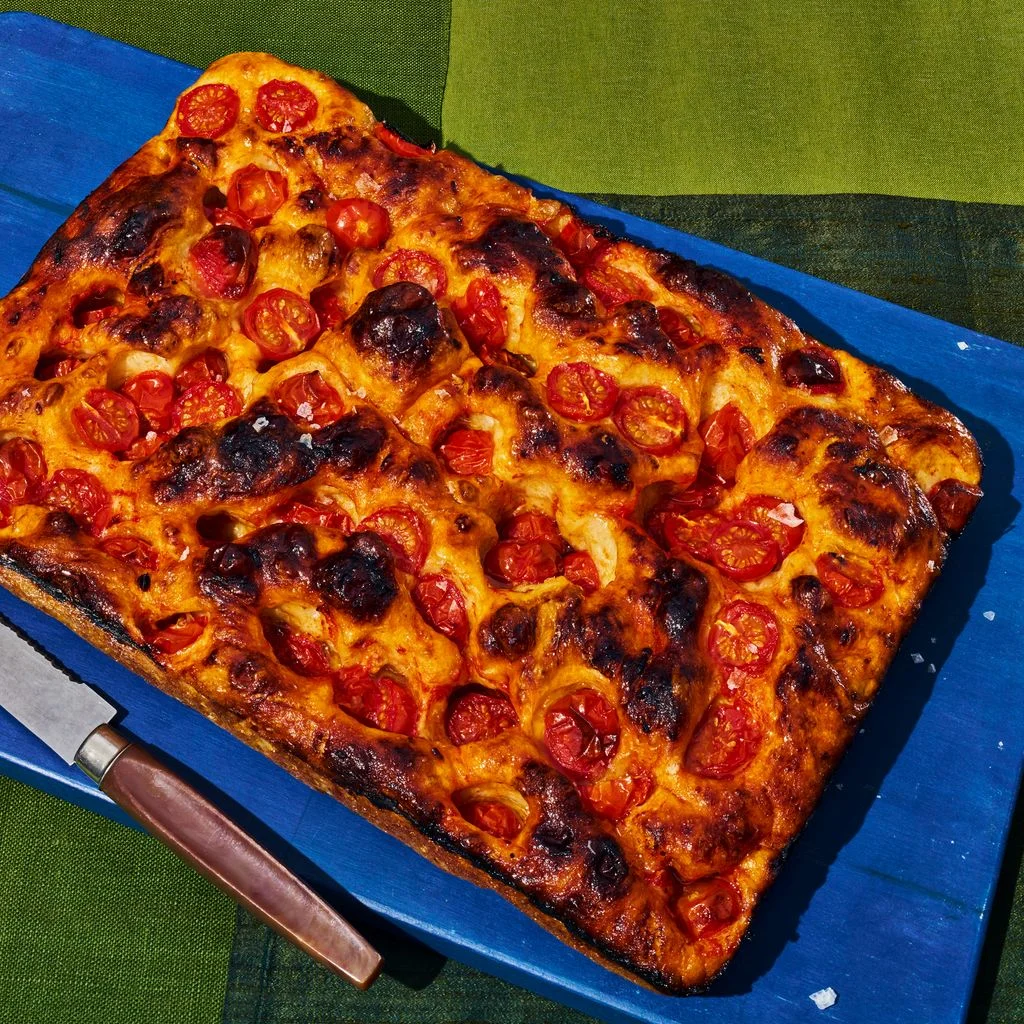 Image may contain Food Pizza Food Presentation Blade Knife and Weapon