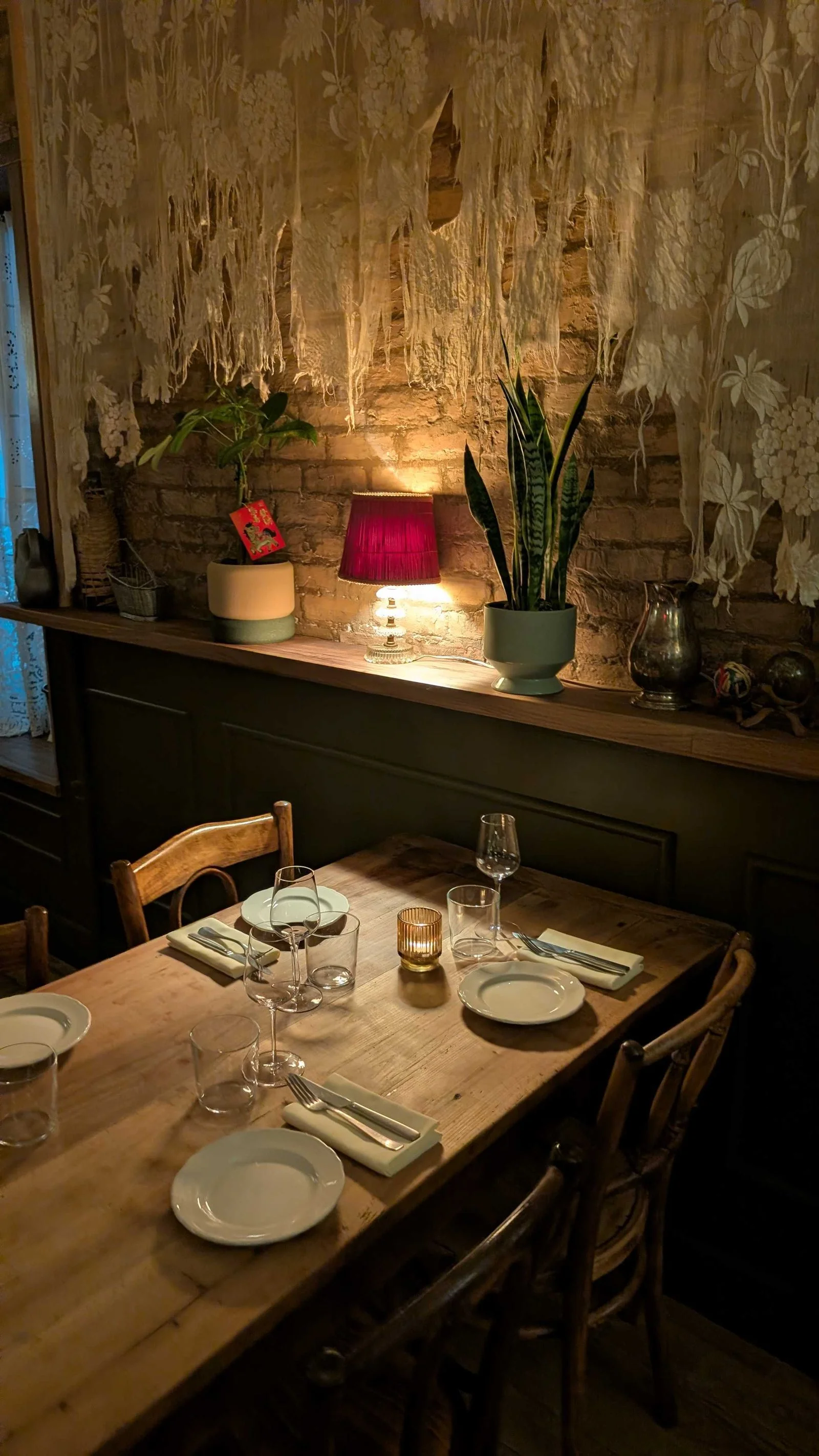 Image may contain Indoors Interior Design Architecture Building Dining Room Dining Table Furniture Room and Table