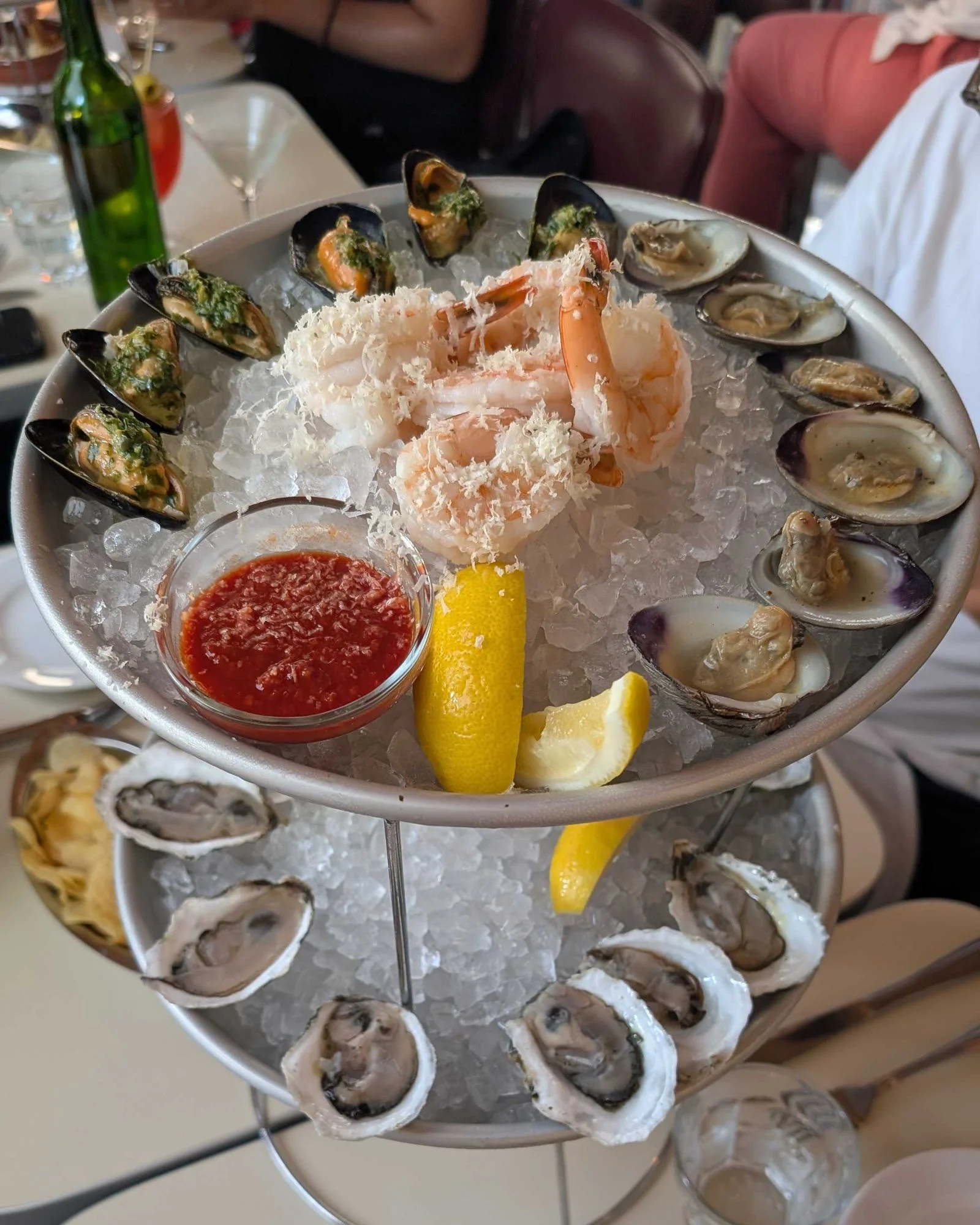 Image may contain Food Food Presentation Ketchup Seafood Person Adult Cup Animal Sea Life and Plate