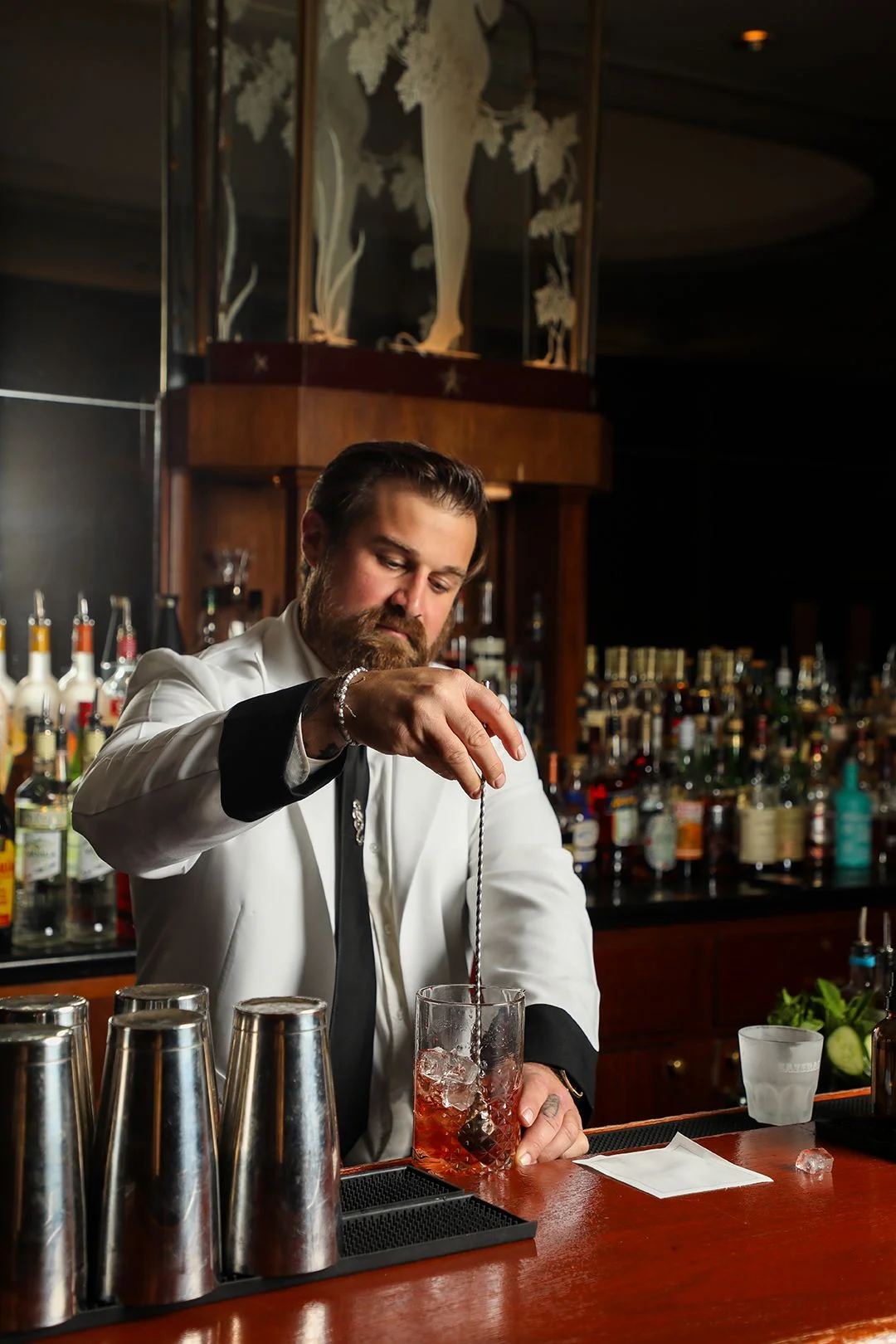 Image may contain Adult Person Wedding Alcohol Bartender Beverage and Bar