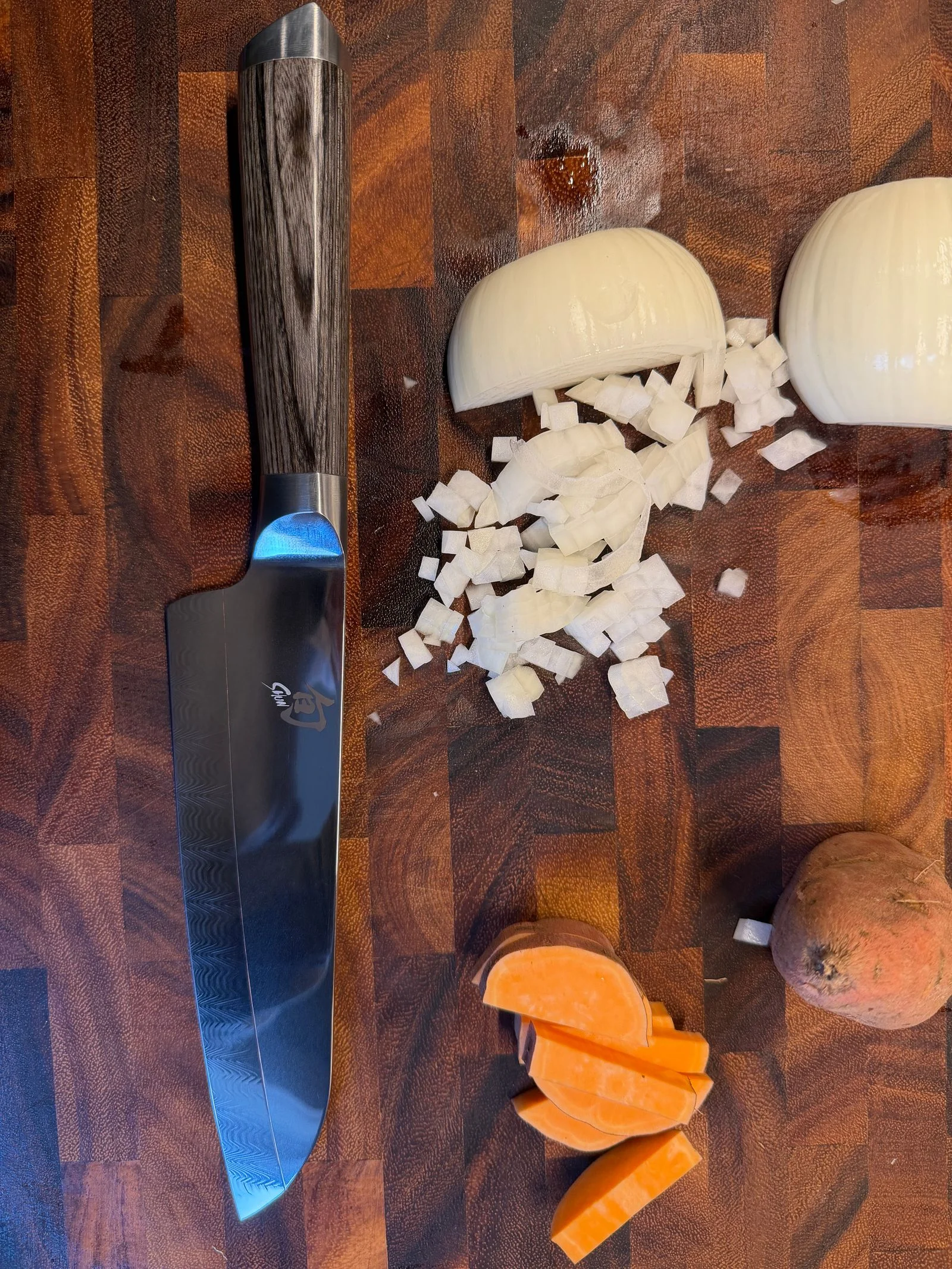 Image may contain Blade Weapon Knife Dagger Chopping Board and Food