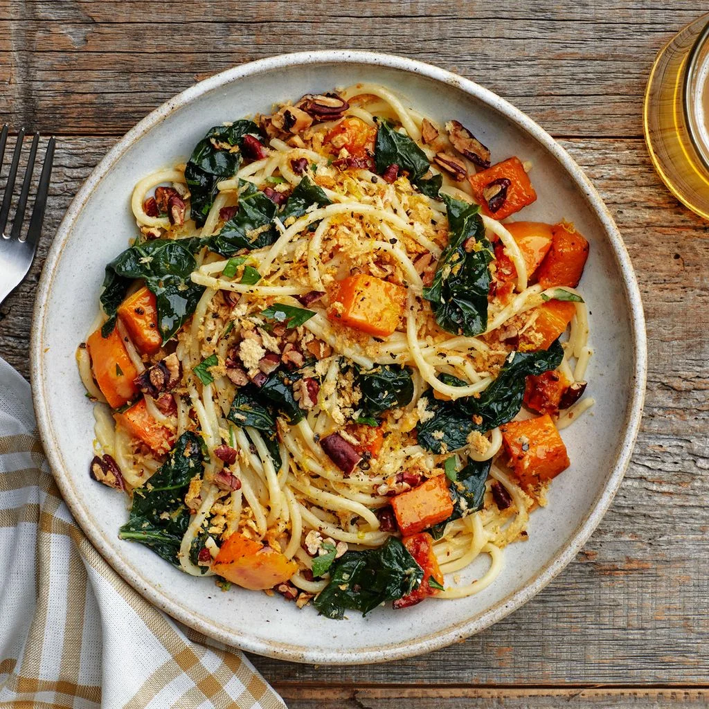 Butternut squash and kale pasta topped with pecan breadcrumbs