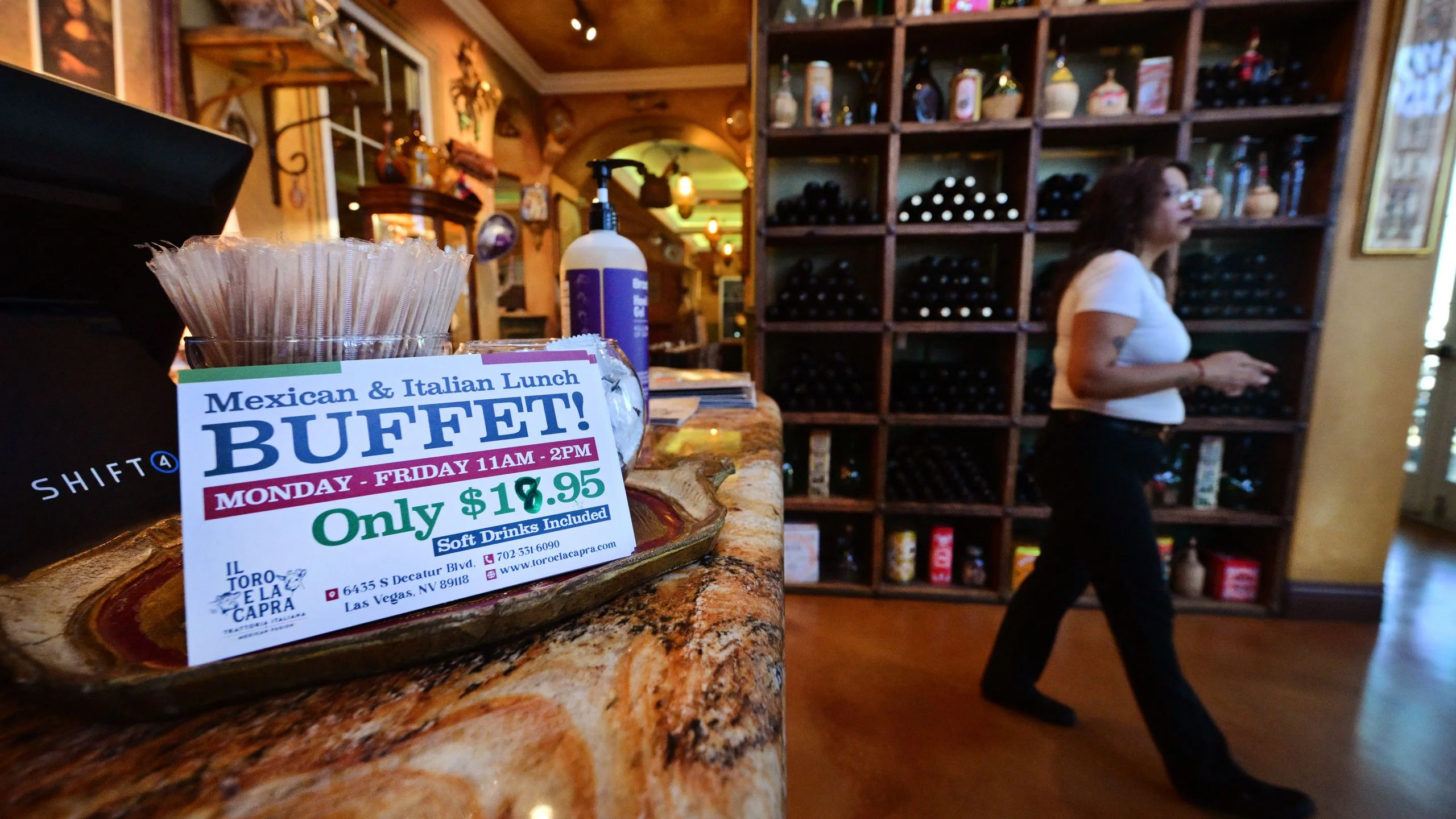 A buffet sign that has been altered due to increase in price over the years