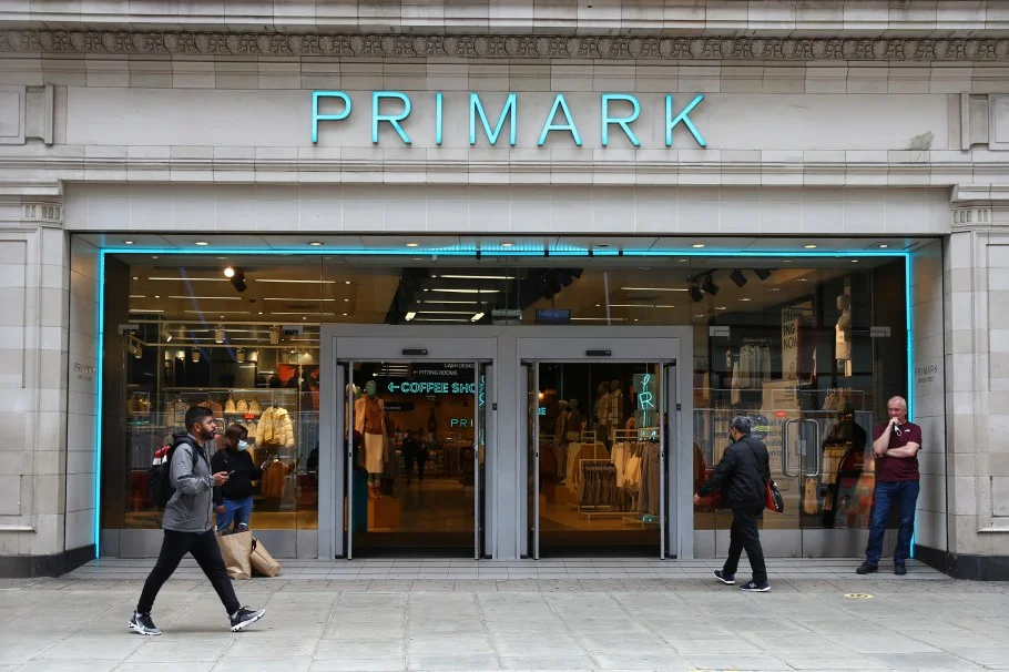 LONDON, ENGLAND - AUGUST 28: A pedestrian walks past a Primark store on Oxford Street on August 28, 2021 in London, England. Primark is offering Covid vaccinations at some of its stores over the Bank Holiday weekend. (Photo by Hollie Adams/Getty Images)