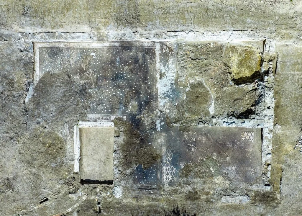An aerial photograph of the rectangular imprints left in the ground from the newly unearthed villa at Castel di Guido