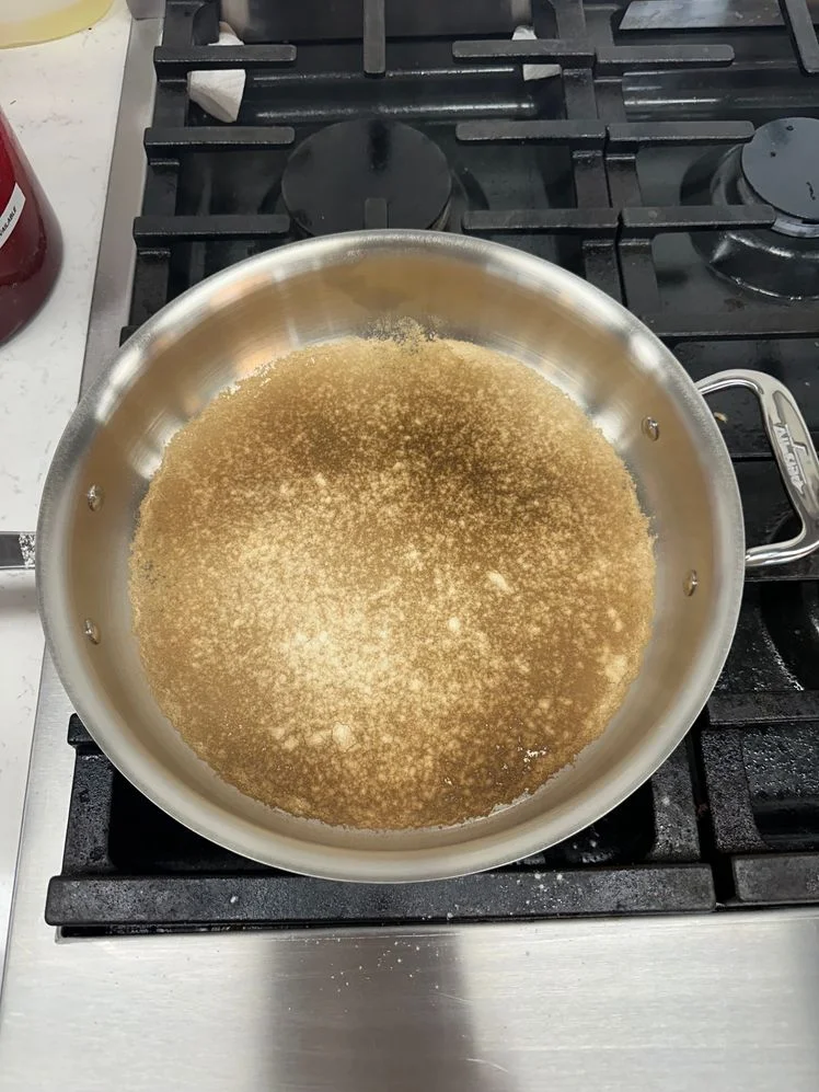 Image may contain: Cooking Pan, Cookware, Cooktop, Indoors, and Kitchen