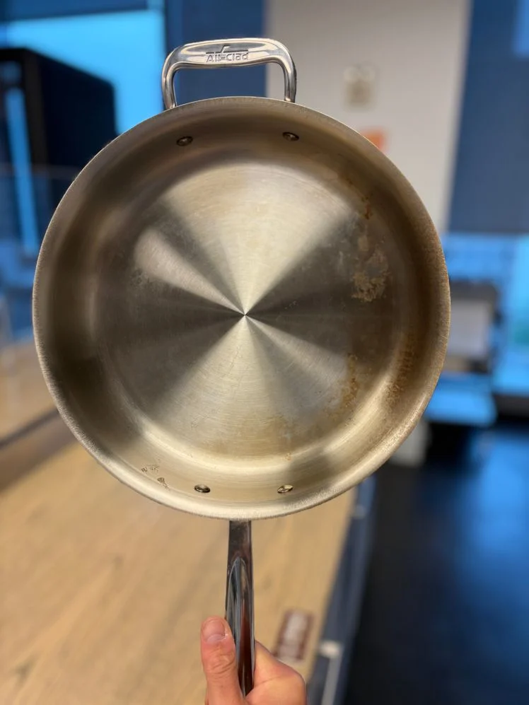 Image may contain: Cooking Pan, Cookware, Baby, Person, and Frying Pan