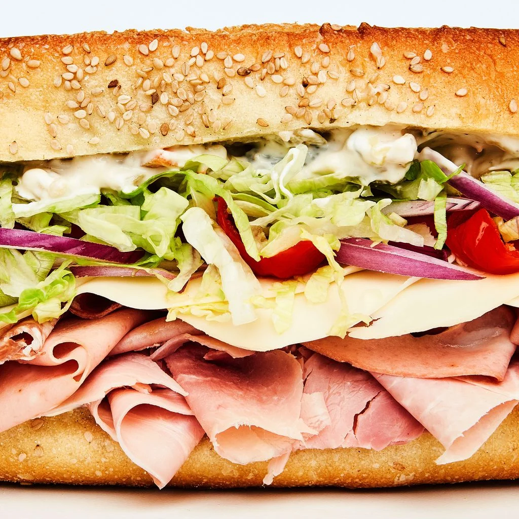 Italianstyle hoagie with ham mortadella provolone lettuce and red onion