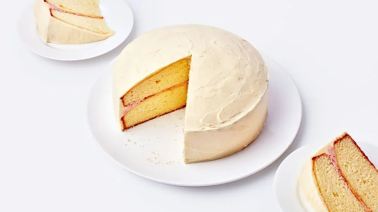 Two layer vanilla cake with white frosting